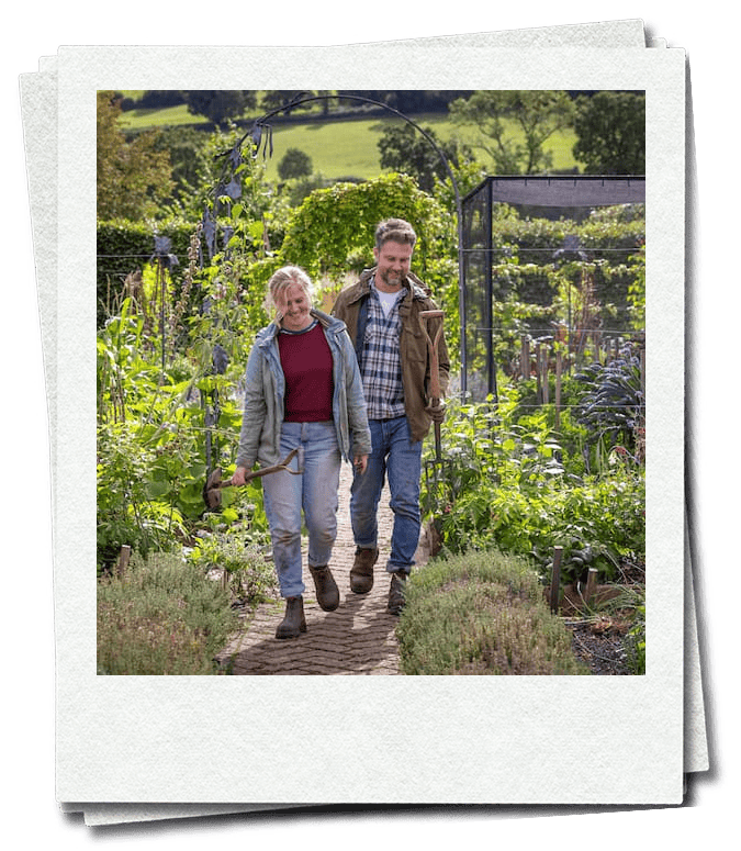 People walking through the Yeo Valley gardens