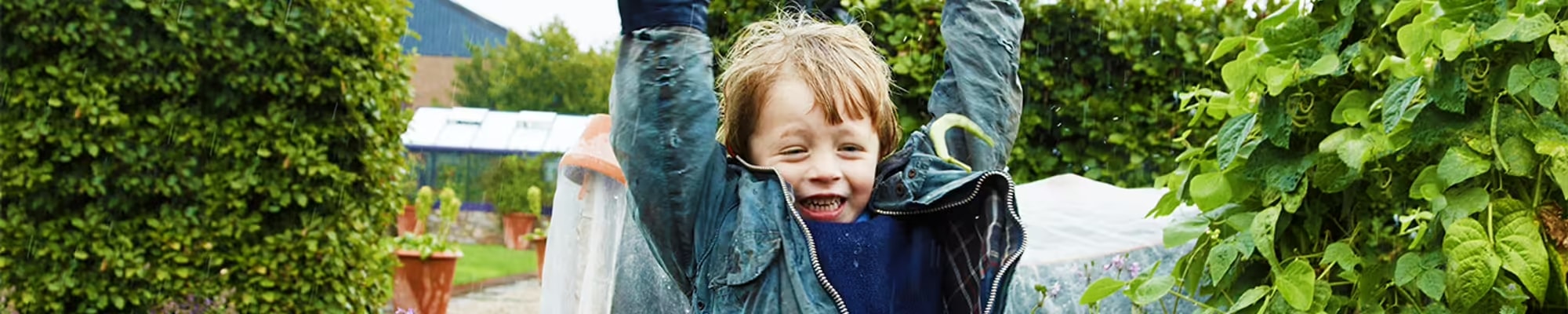 Little boy playing in the Yeo Valley Organic gardens